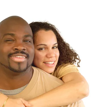 A couple smiling